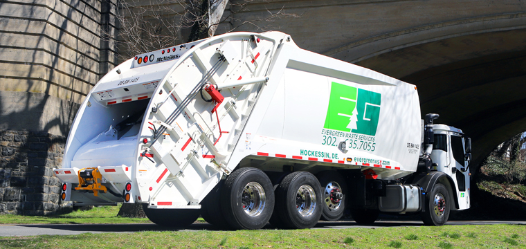 McNeilus Rear Loader Garbage Trucks | XC Extra Compaction